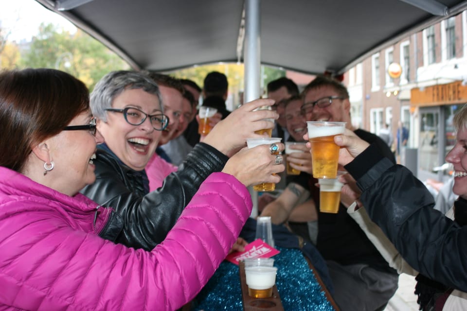 Amsterdam: Party Bike Tour with Beer - The Vibe Onboard: Meet People Fast (And Games Can Happen)