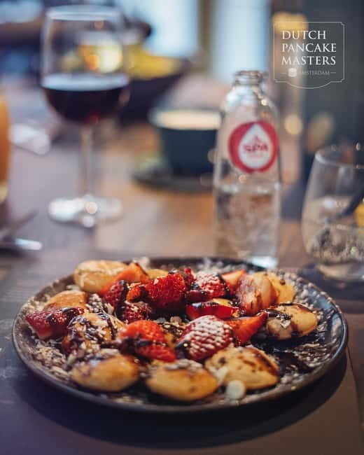 Amsterdam: Poffertjes at Dutch Pancake Masters - What you actually get for $11: sugar, mini pancakes, and toppings