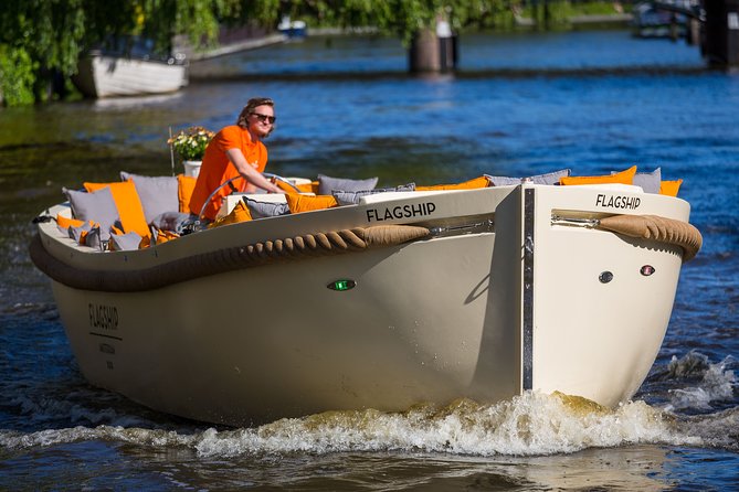 Amsterdam Private BBQ and Drinks Cruise With Onboard Chef - Skipper narration and landmark spotting from the canal