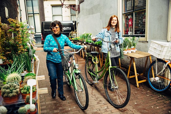 Amsterdam PRIVATE Bike Tour With Locals: Bike & Local Snack Included - How the included snack/drink adds real value