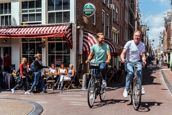 Amsterdam PRIVATE Bike Tour With Locals: Bike & Local Snack Included - Westerkerk on two wheels: a church you can actually clock quickly