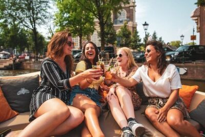 Amsterdam Private Boat Tour with Unlimited Drinks - Getting There: Oosterdokskade 8 Is Close to the Action