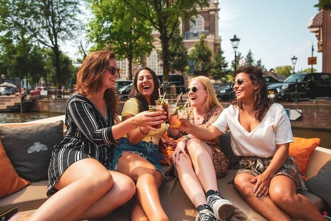 Amsterdam Private Boat Tour with Unlimited Drinks - Getting There: Oosterdokskade 8 Is Close to the Action
