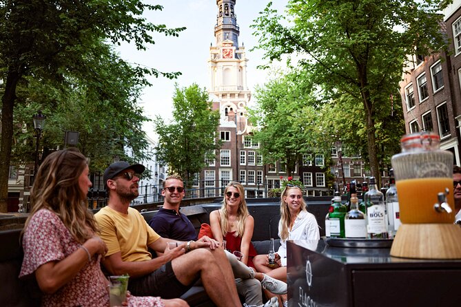 Amsterdam Private Boat Trip with Pizza and Unlimited Drinks - The 1.5-hour canal route: stop by stop, and what to watch for