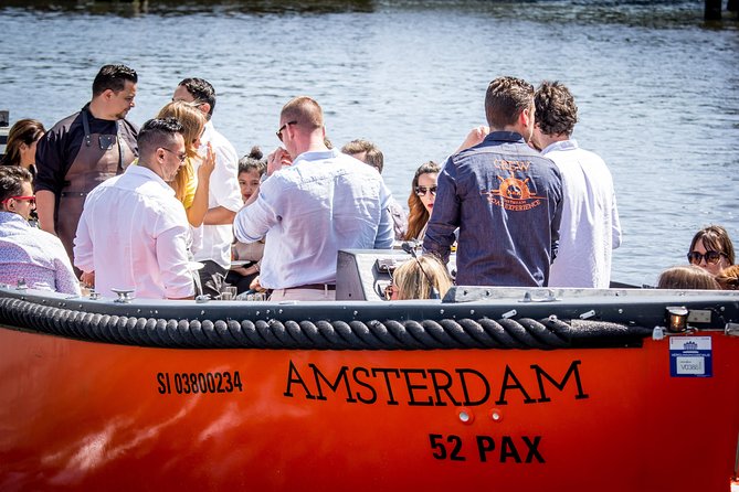 Amsterdam Private Boat Trip With Skipper, Burger and Beers - Protestant church bell tower views and the Hermitage Amsterdam connection