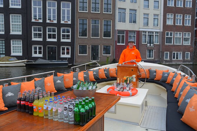 Amsterdam Private Boat Trip With Skipper, Burger and Beers - The Amstel River bridge, flower power, and the famous floating market