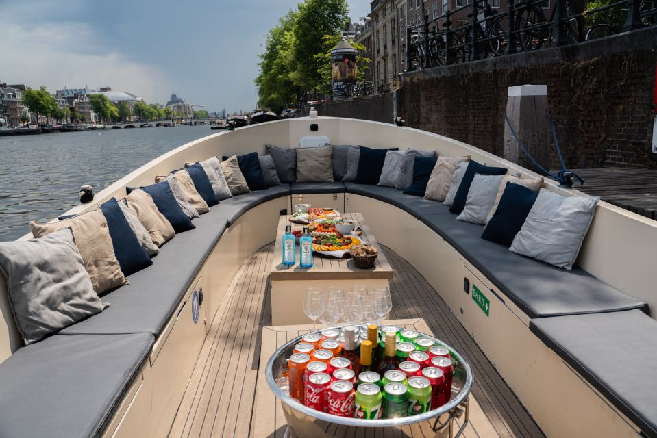Amsterdam: Private Canal Booze Cruise with Unlimited Drinks - The 15 minutes by the Red Light District: quick, iconic, and very “Amsterdam”