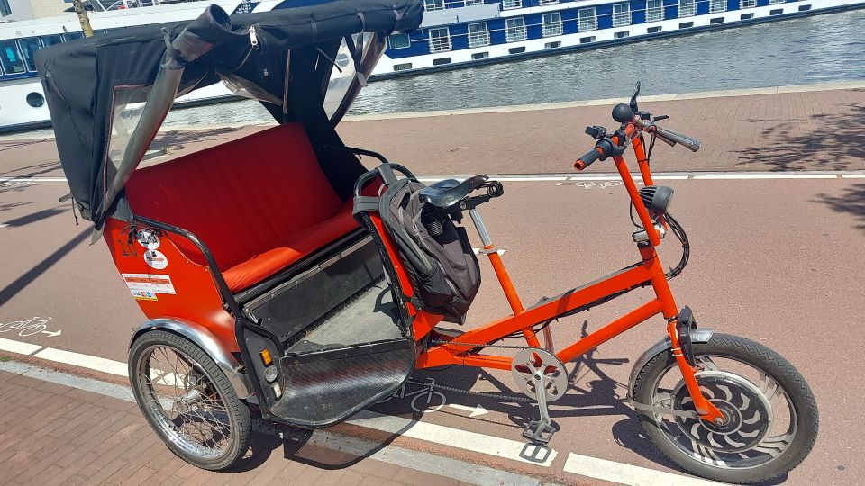 Amsterdam: Private City Highlights Tour by Rickshaw - Dam Square: the 13th-century idea that shaped modern Amsterdam