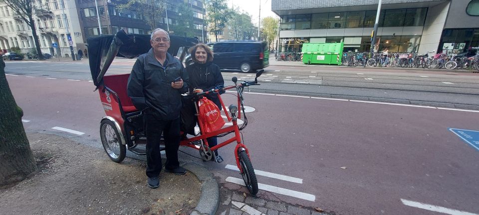 Amsterdam: Private City Highlights Tour by Rickshaw - Chinatown and Nieuwmarkt: food streets, markets, and everyday Amsterdam