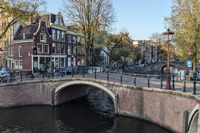 Amsterdam private city walking experience with a local - Nieuwmarkt: Waag, guilds, and the dancing houses