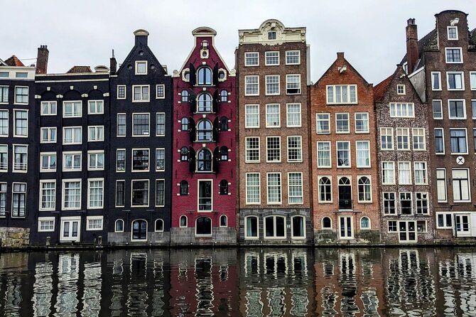 Amsterdam private city walking experience with a local - Dam Square and the Royal Palace: Power, memory, and the street-level view