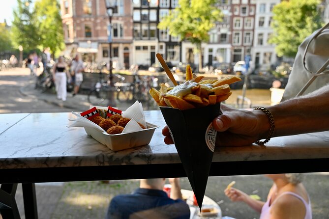 Amsterdam Private Food & Drinks Tour by UNESCO Canals & Jordaan - Dutch Sashimi Herring and the Stroopwafel Moment You’ll Remember
