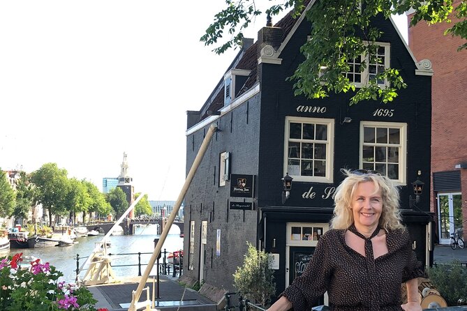 Amsterdam private guided tour with Marieke, local guide - Dam Square: the city’s origin point, right in front of you