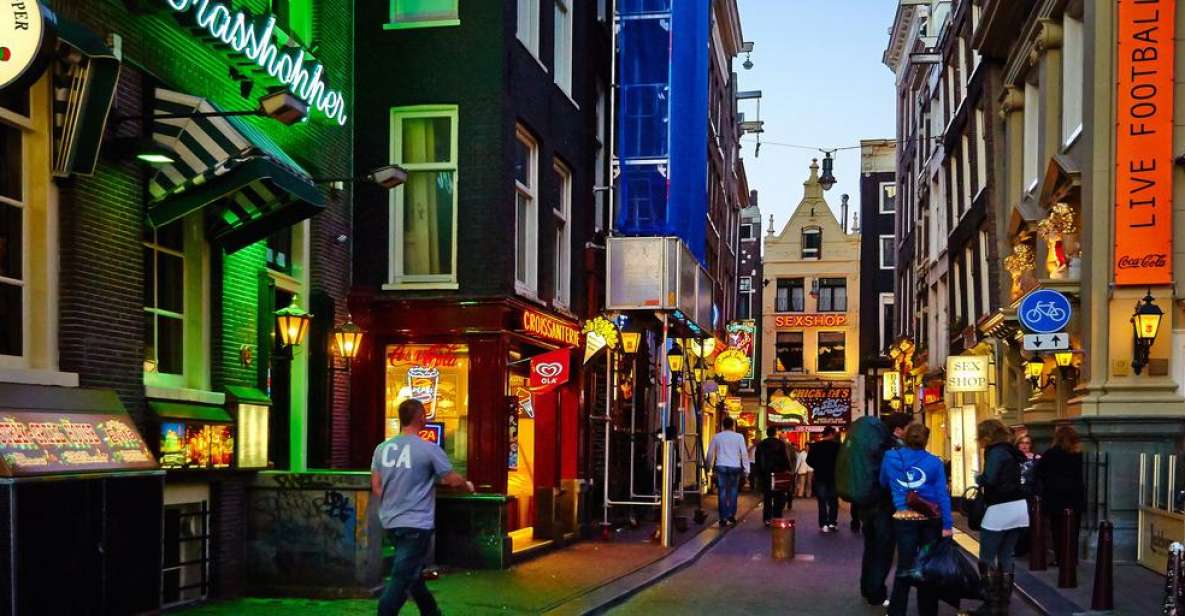 Amsterdam: Private Red Light District and Food Tour - Dam Square and Oude Kerk: the neighborhood’s front door
