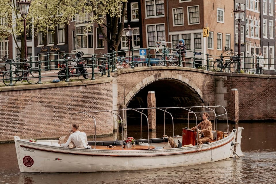 Amsterdam: Private Romantic Evening Boat Tour with Prosecco - Weather proof without sacrificing the romance