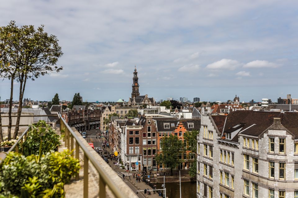 Amsterdam: Private Walking Tour of Jordaan & De 9 Straatjes - Westerkerk at the Jordaan edge: a historic anchor for your walk