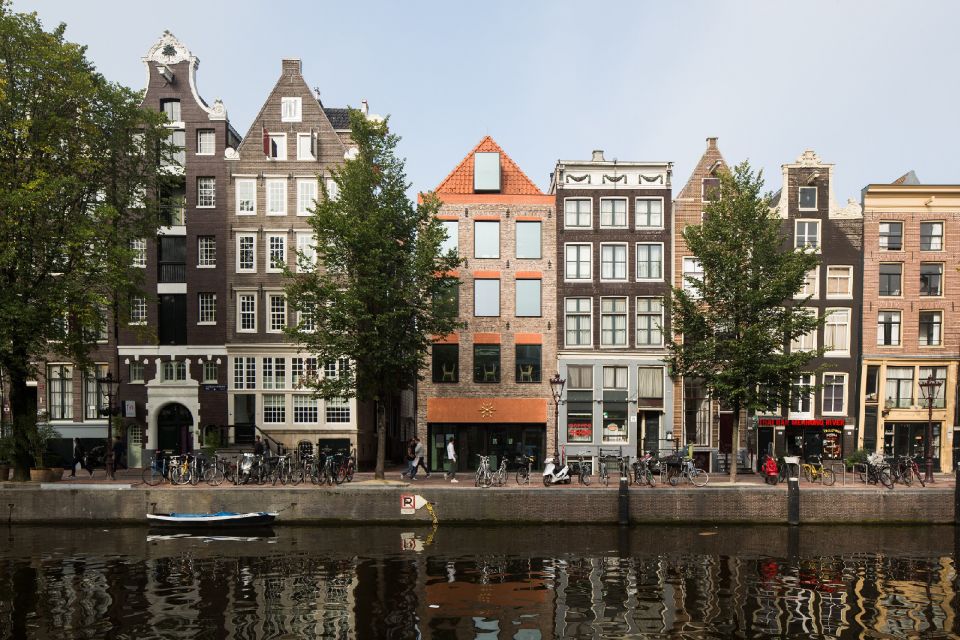 Amsterdam: Red Light District 1-hour Smartphone Audio Tour - Oude Kerk and Belle: the oldest church and a rights symbol