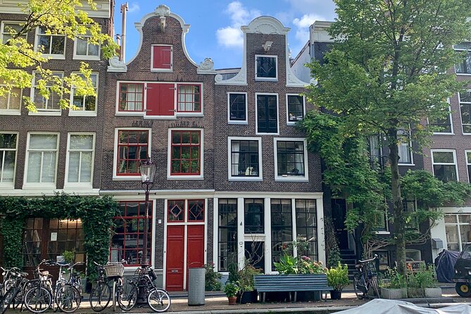 Amsterdam: Red Light District & City Tour (Private tour) - Amsterdam Centraal: Photos, Then a Critical Perspective
