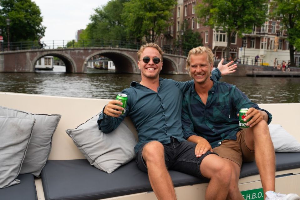 Amsterdam: Red-Light District Pub Crawl and Booze Boat Tour - The booze boat portion: canals, open bar, and a built-in party warm-up