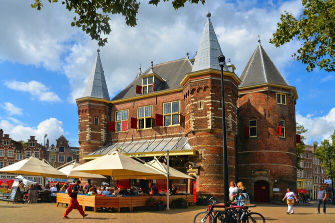 Amsterdam Red Light District Treasure: Self-Guided Tour & Quest - Stop 1: Centraal Station and the Neo-Renaissance “First Clue”