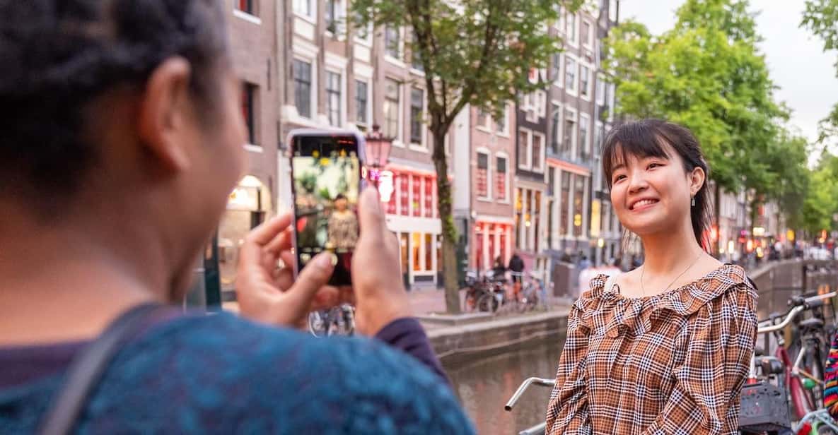 Amsterdam: Red Light Tour Exclusive + Peep Show - Meeting at Dam Square: your starting point and tone-setter