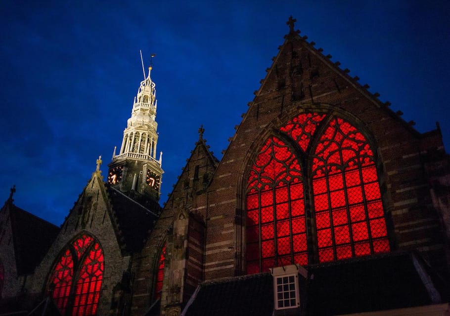 Amsterdam: Red Light Tour Exclusive + Peep Show - Warmoesstraat and the Dancing Houses photo stops