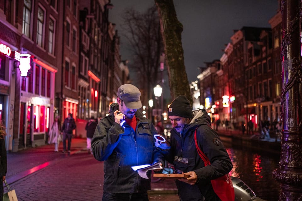 Amsterdam: Self-guided Red Light District Pub Crawl Mystery - Working the escape-room-style puzzles in real bars