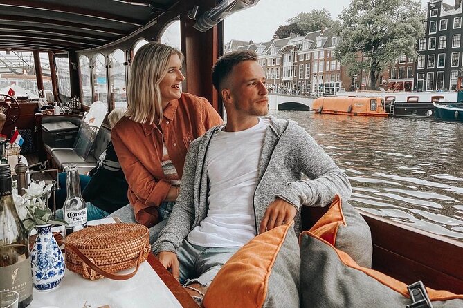 Amsterdam Small-Group Bike Tour With Canal Cruise, Drinks, Cheese - Dealing With Bike Reality: Quality, Comfort, and Pace