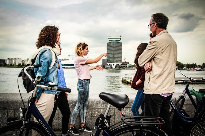 Amsterdam Small-Group Bike Tour With Canal Cruise, Drinks, Cheese - De Gooyer Windmill: Passing a Famous Landmark Like a Local