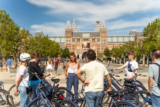 Amsterdam Small-Group Bike Tour With Optional Canal Cruise - ARTIS and the narrow bridge: nature and cinematic Amsterdam