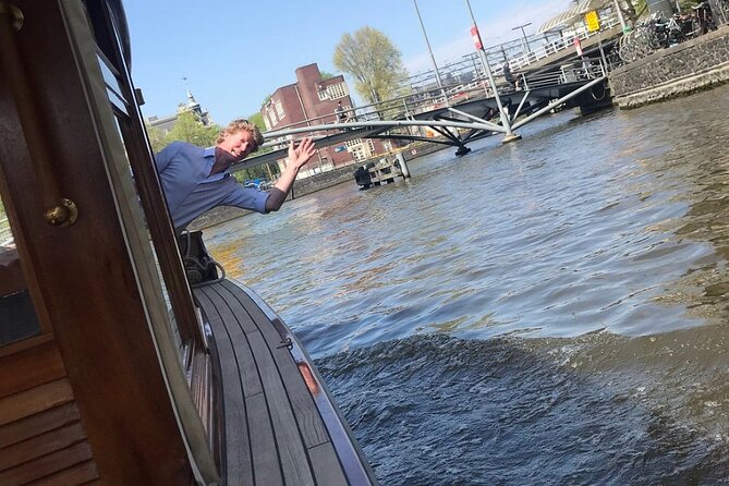 Amsterdam small-group canal cruise in 1920s saloon boat - Where you meet on Prinsengracht 579 (and what that implies)