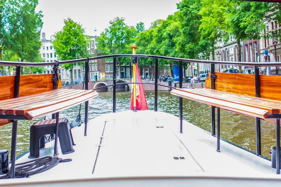 Amsterdam: Small-Group Canal Cruise incl. Drinks and Snacks - Old town, the Red Light District, and quieter neighborhoods: how the cruise handles the city’s edges