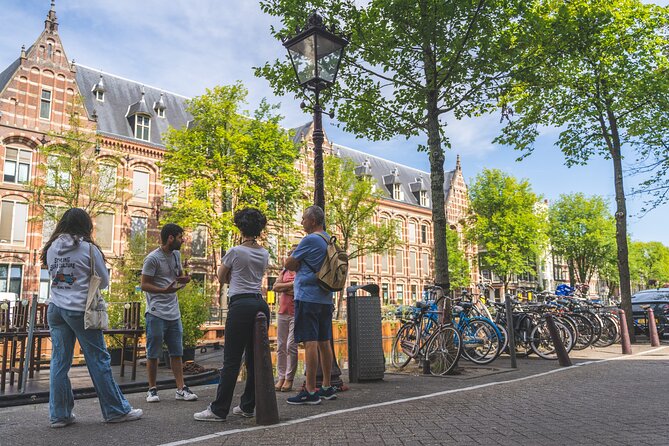 Amsterdam Small-Group Walking Tour with Typical Dutch Pancake - Amsterdam Centraal Stop: The Station as a Landmark