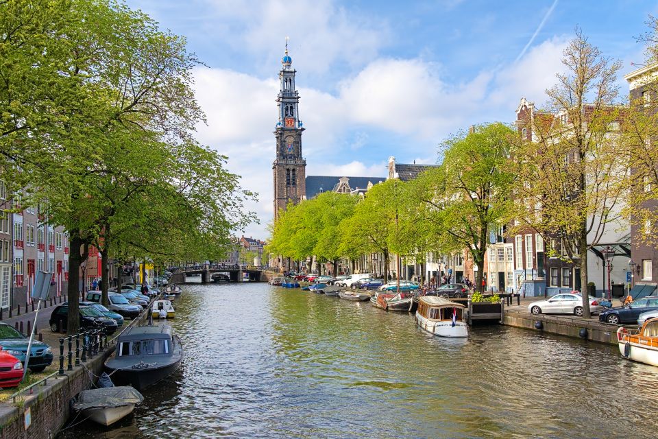 Amsterdam Walking Tour and Canal Cruise - Jordaan streets and a local street market stop for real-life Amsterdam