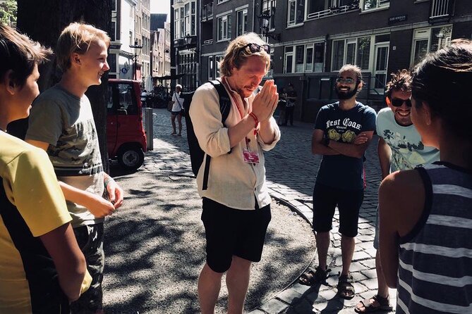 Amsterdam Walking Tour with a local comedian as guide - Stop-by-Stop: Dam Square to Spuistraat