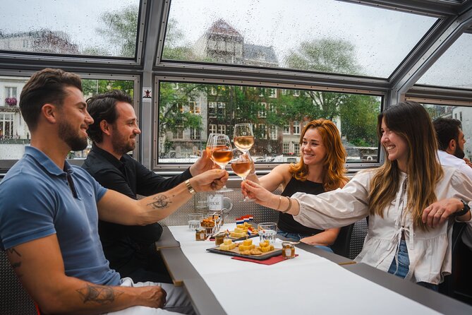 Amsterdam: Wine and Cheese Evening Cruise - The 1.5-hour Canal Belt route: bridges, Golden Age houses, and cozy interiors