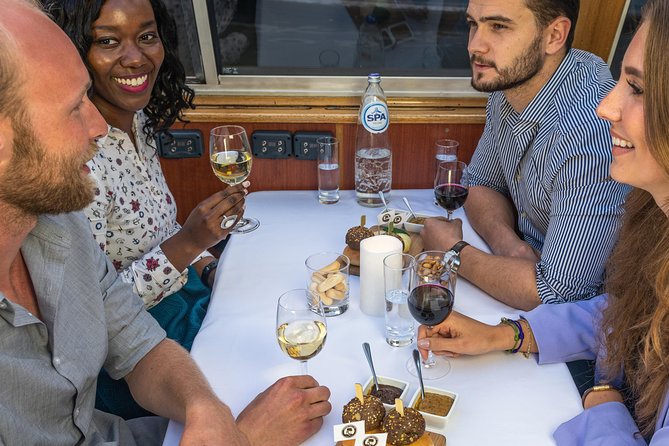 Amsterdam Wine and Cheese Evening Cruise - Narration and City Facts: Helpful, But Not Guaranteed