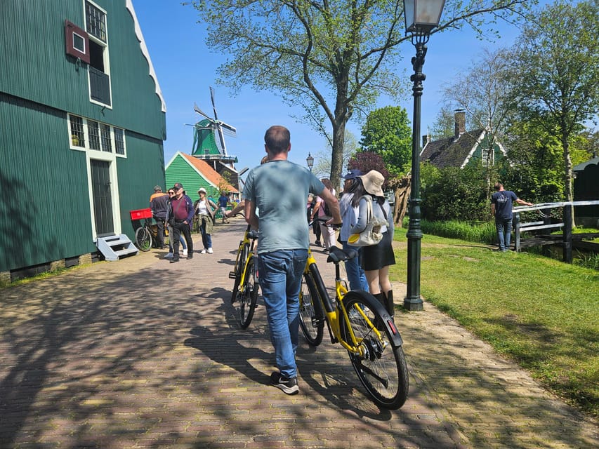Amsterdam: Zaanse Schans E-Bike Tour with Windmills & Cheese - Zaanse Schans village: windmills, crafts market time, clogs, and cheese tasting