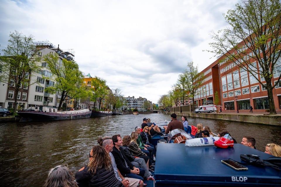 Amsterdam:Old City Canal Cruise with Live Guide and Open Bar - Key highlights that make this cruise worth your time