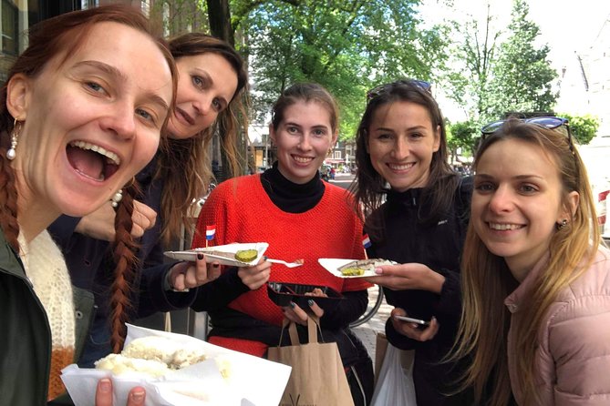 Amsterdam's Unexpected Treasures Private Walking Tour - Dam Square and the Royal Palace area: famous, but not the full story