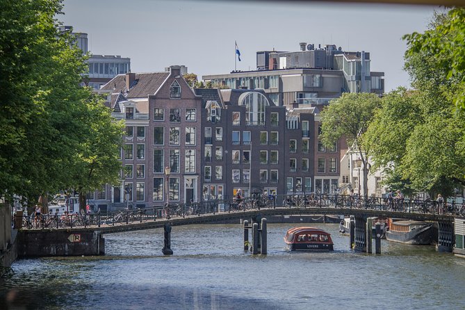 Anne Frank Private Bike Tour in Amsterdam - Stop 1 on the Amstel: WWII Stories Along the Water