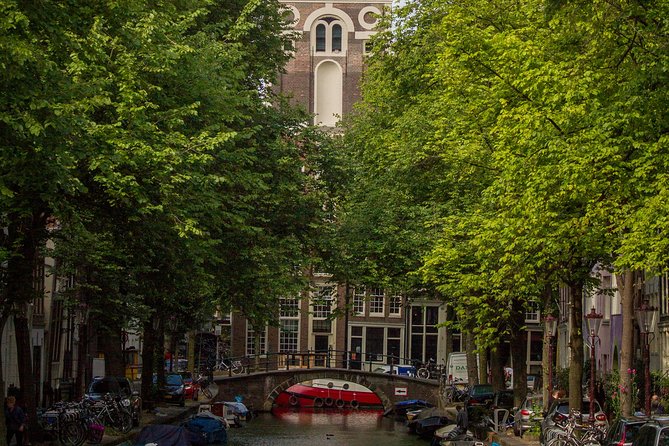 Anne Frank Private Bike Tour in Amsterdam - Spinoza Monument and De Schaduwkade: Short Pauses, Big Meaning