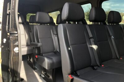 Arrival Private Transfer Amsterdam Airport to Amsterdam City Center by Minibus - Meeting at Schiphol: Sign, Arrival Hall, and Easy Communication