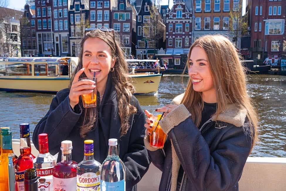 CHEESE AND DRINKS TOUR: A TASTE OF AMSTERDAM ON THE CANALS - Live Guide Storytelling (Including Light Art) That Keeps You Looking