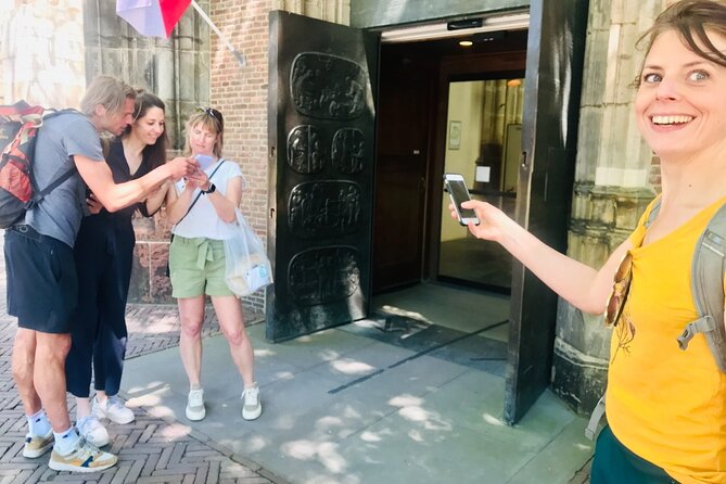 Discover Haarlem with a self-guided Outside Escape city game tour - Bakenesserkerk: spotting the white tower up close