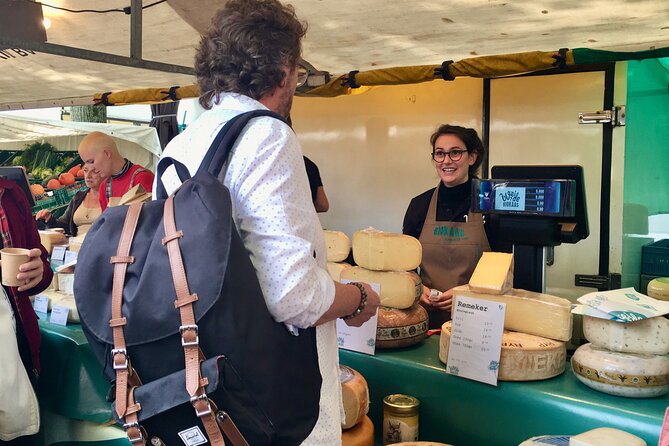 Exclusive Cheese Walk & Dutch Wine Discovery - Passing the Anne Frank House and heading into the Jordaan