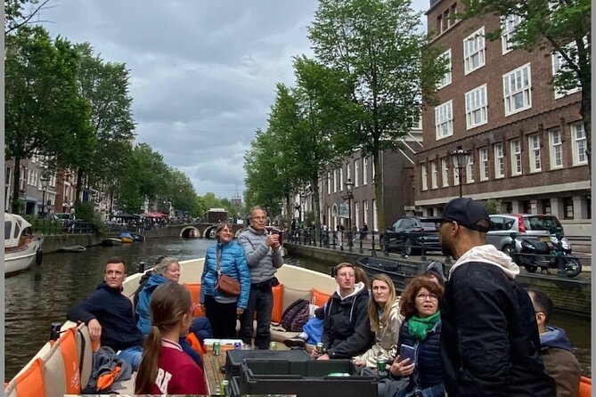 Explore Amsterdam by Bike in the Company of a French Local Guide - Vondelpark, Negen Straatjes, Rijksmuseum, and Museumplein