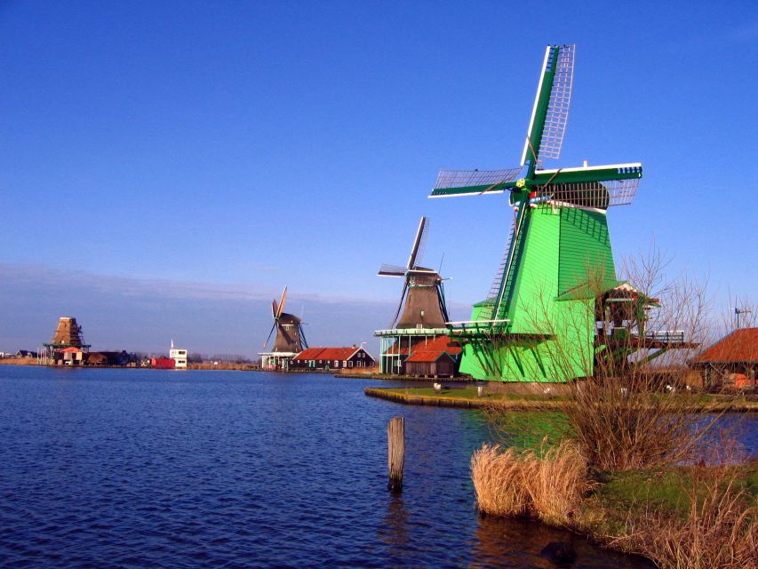 From Amsterdam: Small Group Zaanse Schans and Volendam Tour - Volendam seaside port walk: seafood, snacks, and local costume fun
