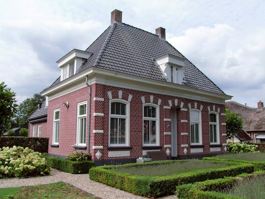 From Amsterdam: Zaanse Schans and Giethoorn Countryside Trip - Giethoorn: car-free canals, thatched cottages, and guided boat time