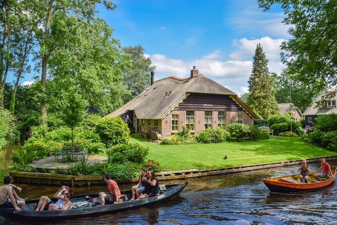 Giethoorn Day Trip from Amsterdam With Cruise and Cheeseplatter - Getting to Giethoorn: the 10:00 departure and coach ride reality